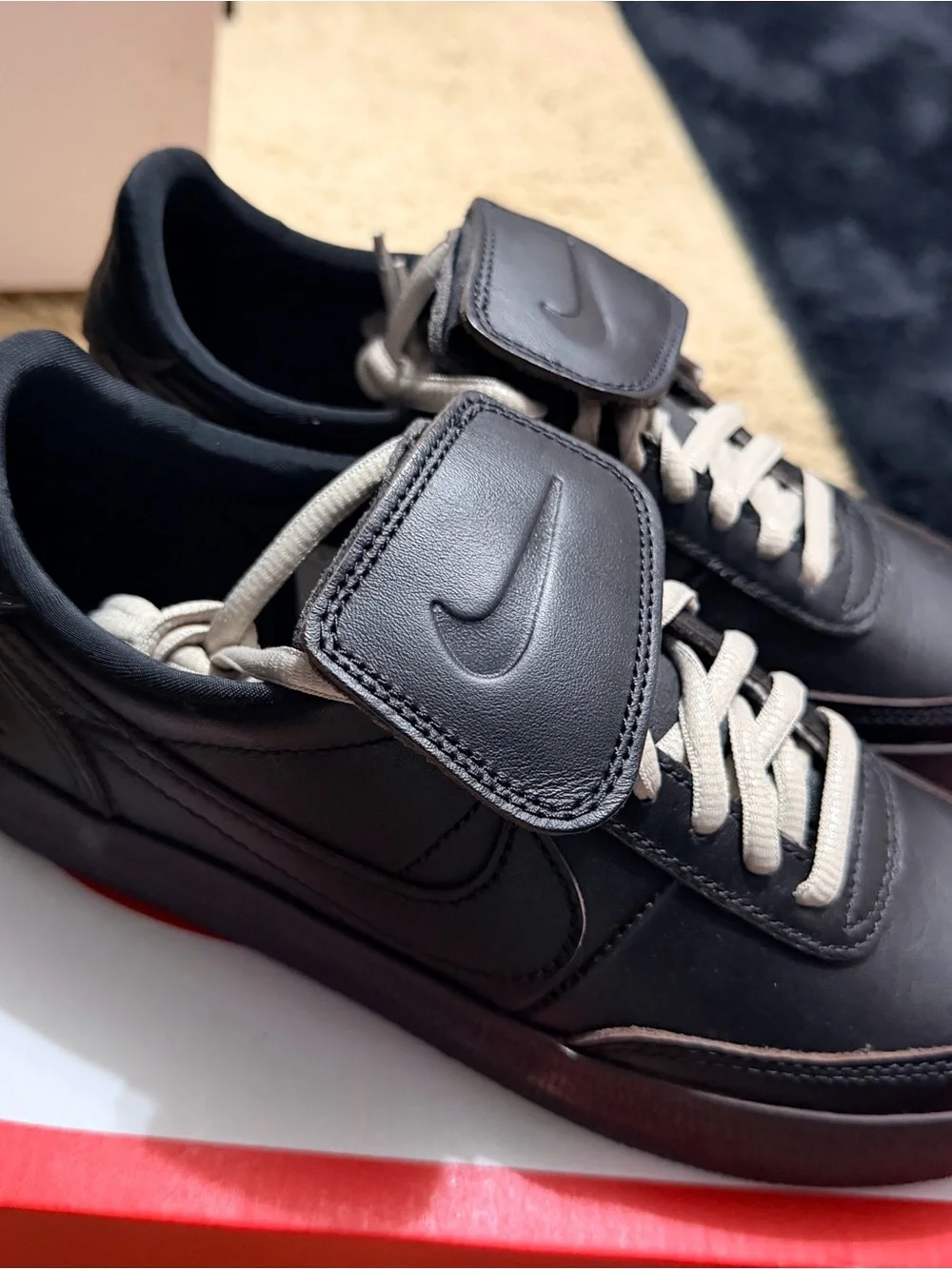 Nike Black Leather Men's Sneakers with Cream Laces and Strap Accent